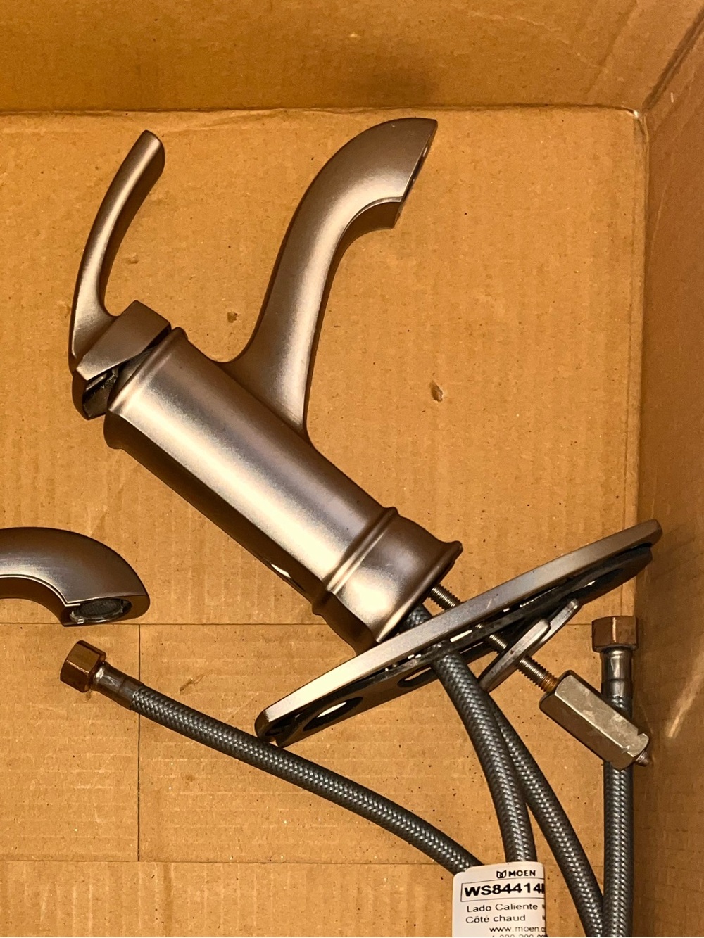 Moen Brushed Nickel Single-Handle Bathroom Faucet , one of two.
